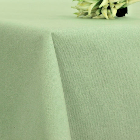 Dali Mint – Ensfarvet tekstilvoksdug, 140 cm bred