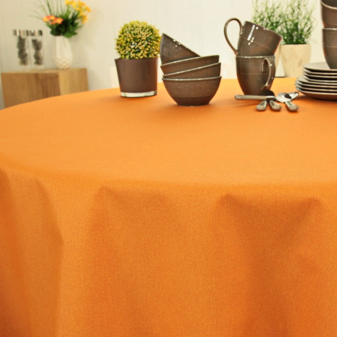 Dali Orange – Ensfarvet tekstilvoksdug – 160 cm bred, rund