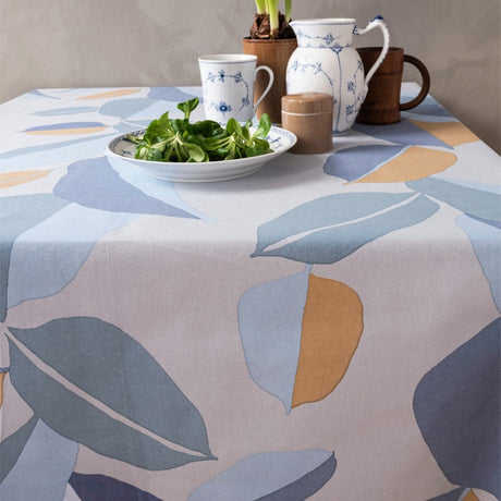 Palm Blue – Susanne Schjerning tekstilvoksdug med skridsikker bagside